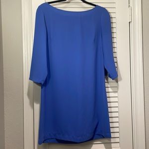 Size S light blue mini dress with 3/4 sleeves and peek back slit